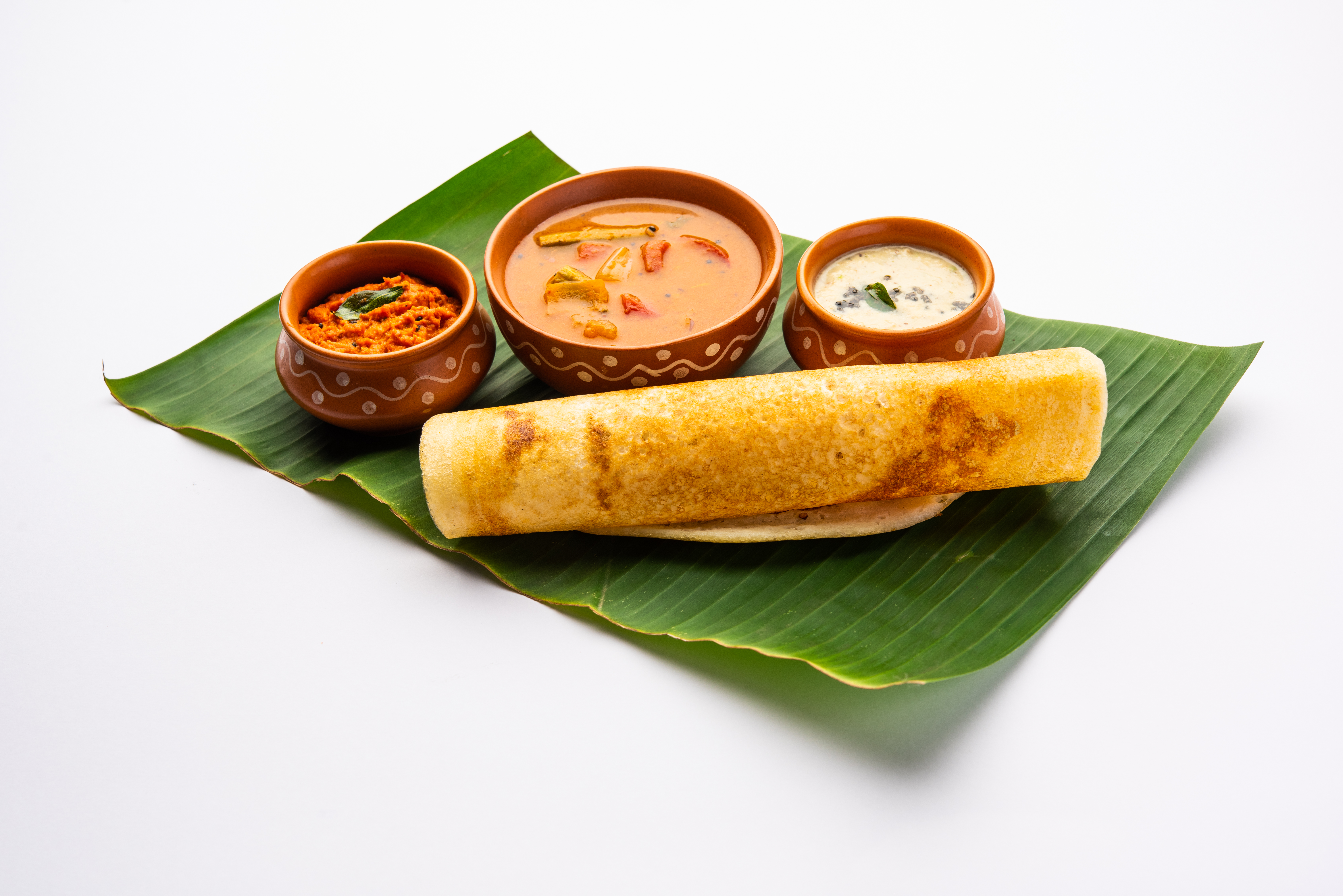 Family enjoying dosa breakfast